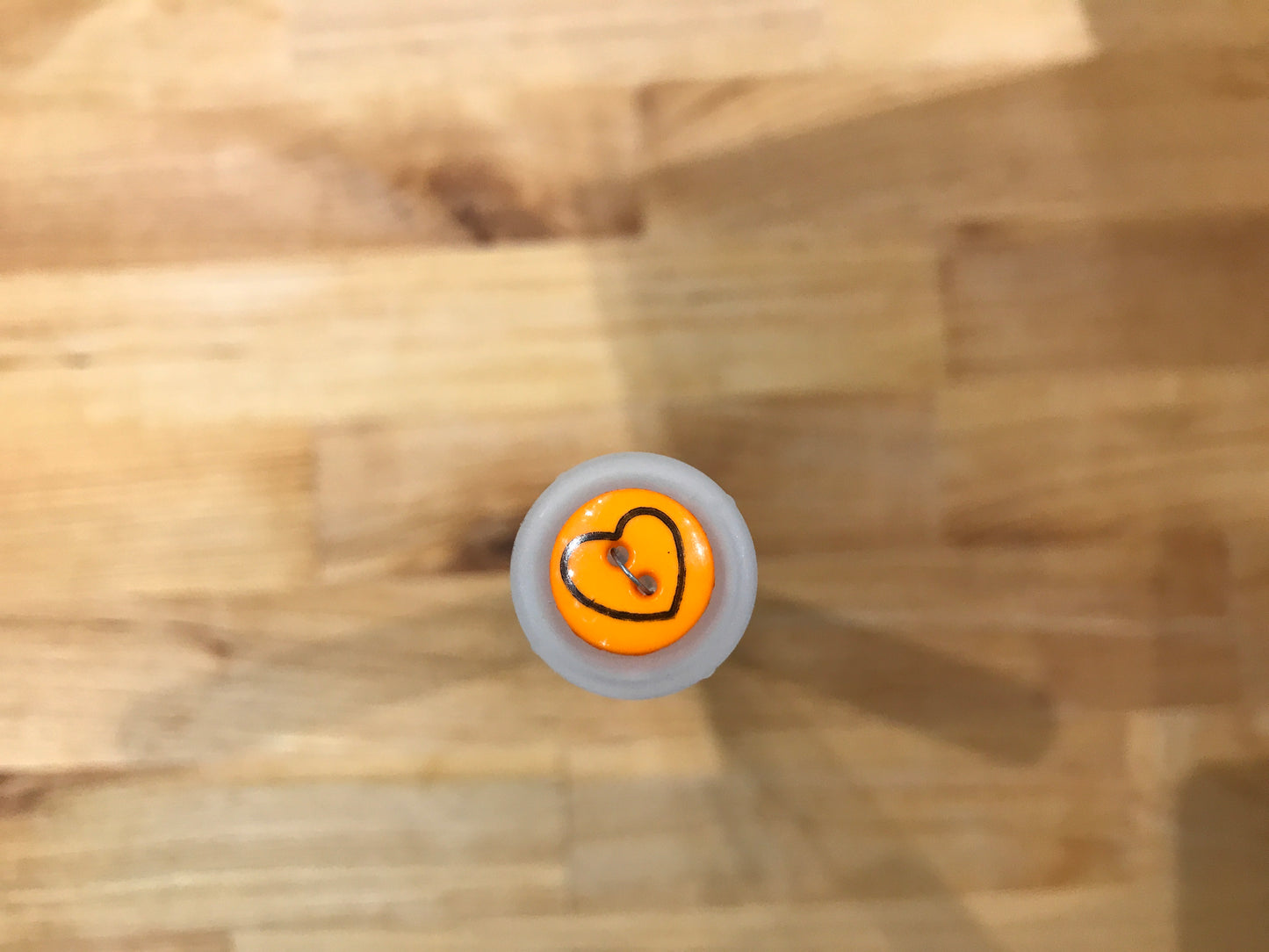 Orange with black outlined heart 13mm